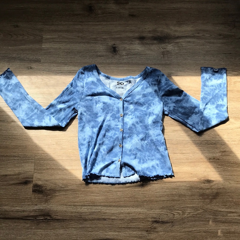 Blue long sleeve shirt with buttons and ruffled sleeves